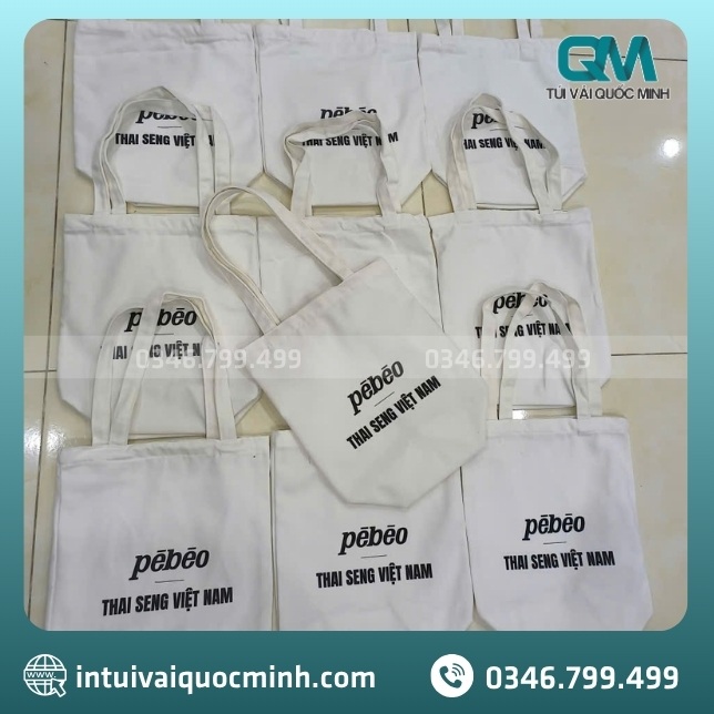 Quy trình may túi vải canvas in logo Pébéo tại Quốc Minh